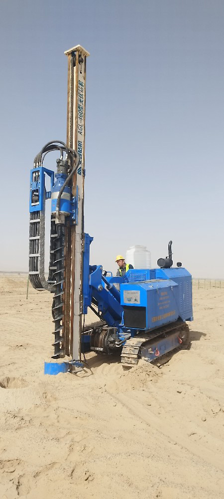 Anman AGL-460 drill working on solar micro-piles in Tibet desert