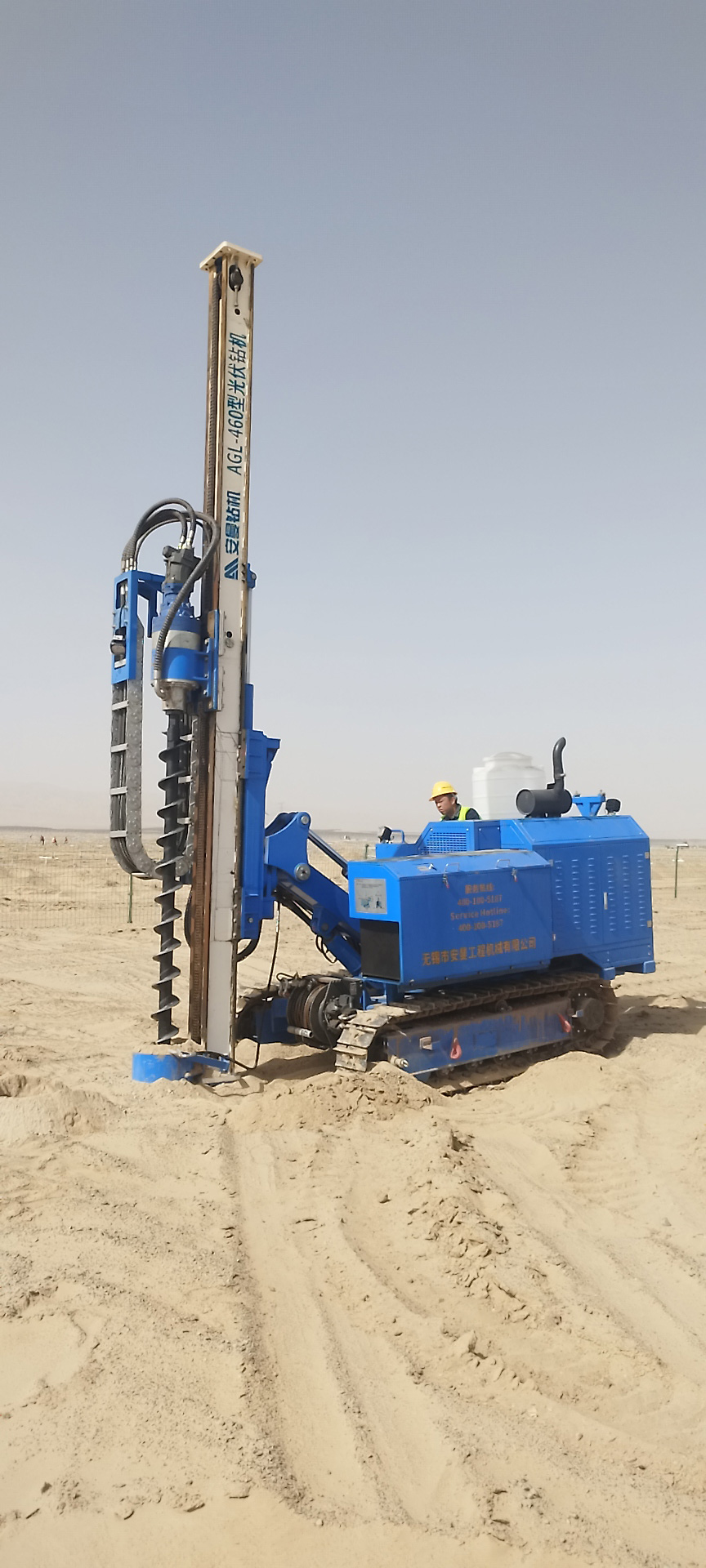 Anman AGL-460 drill performing 90-degree solar pile drilling